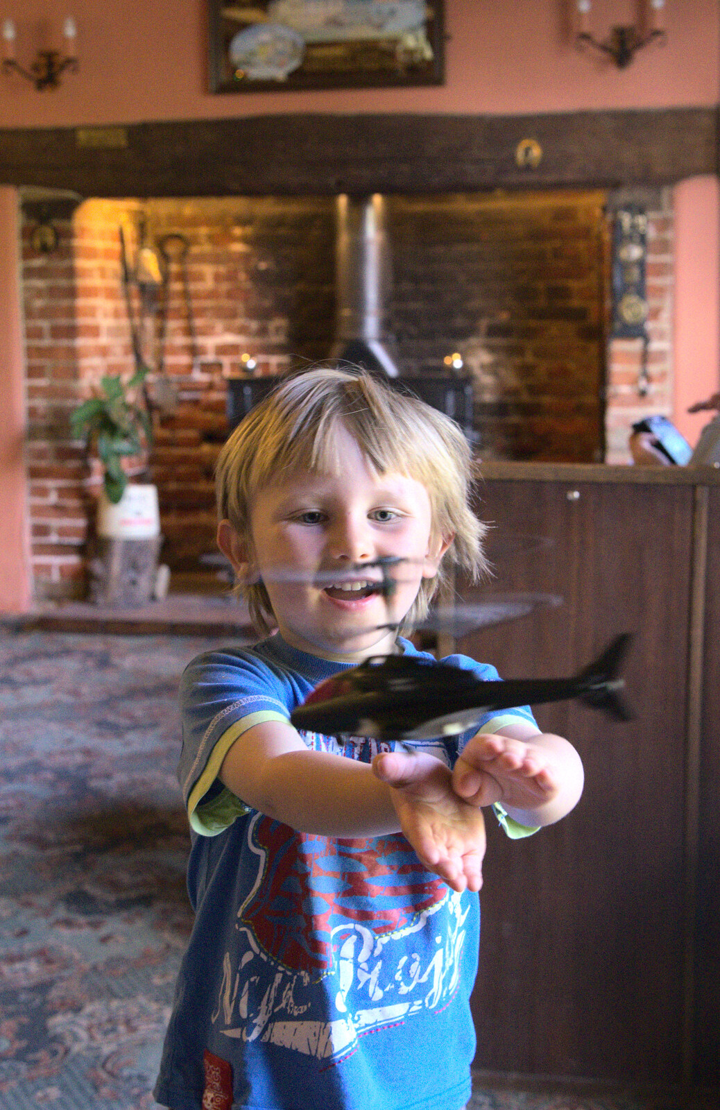 Oak tries to catch the flying helicopter from Matthew's Birthday up The Swan Inn, Brome, Suffolk - 17th August 2014