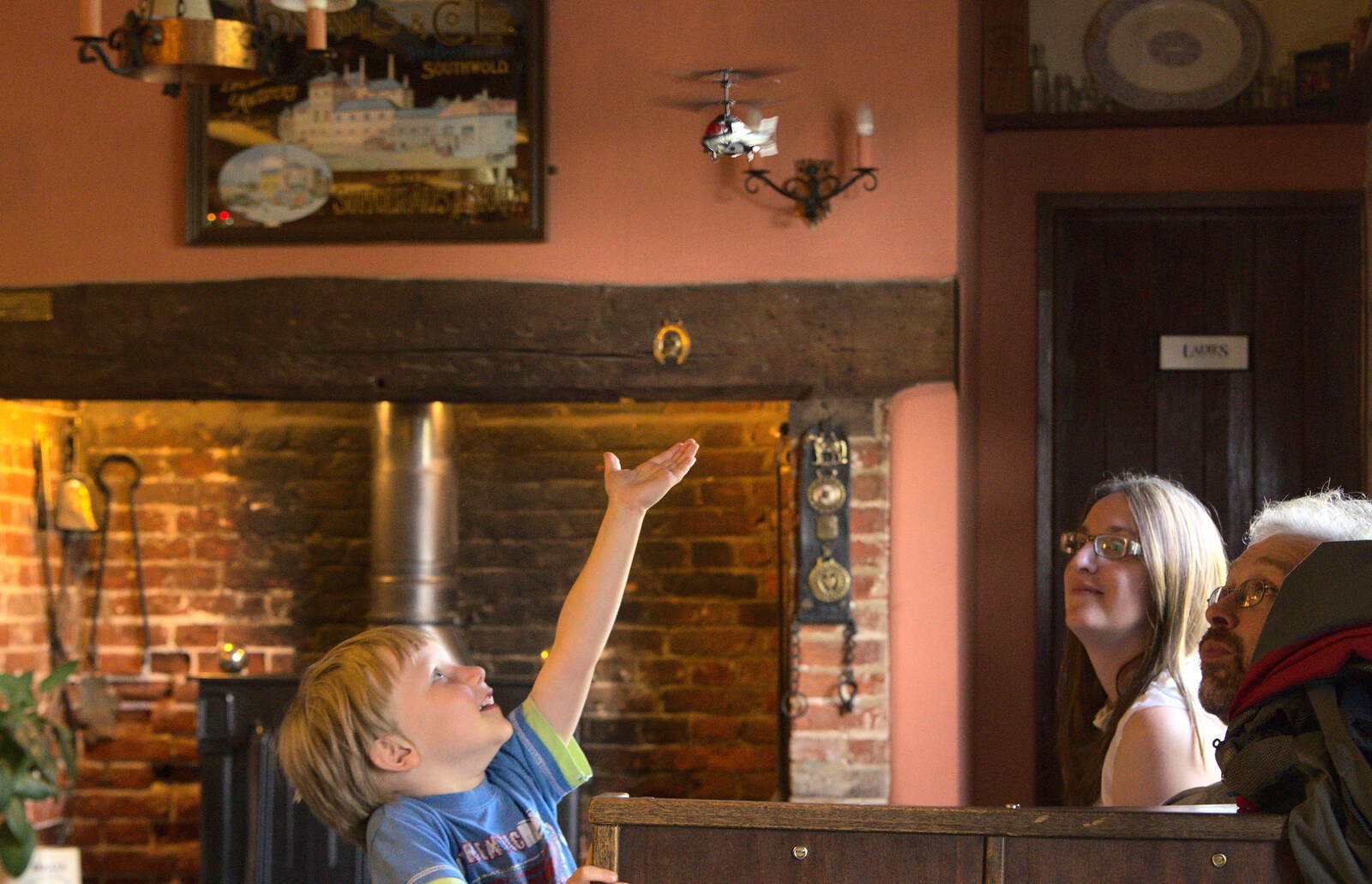 Oak's helicopter is up in the air from Matthew's Birthday up The Swan Inn, Brome, Suffolk - 17th August 2014