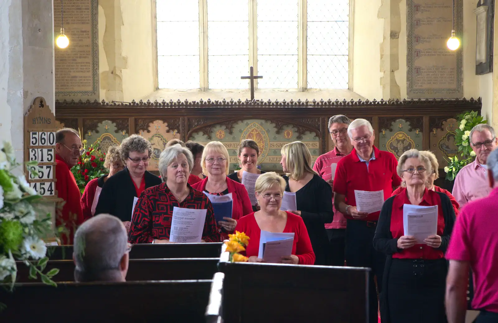 Isobel giggles at the back of the church, from The Oaksmere, and the Gislingham Flower Festival, Suffolk - 24th August 2014