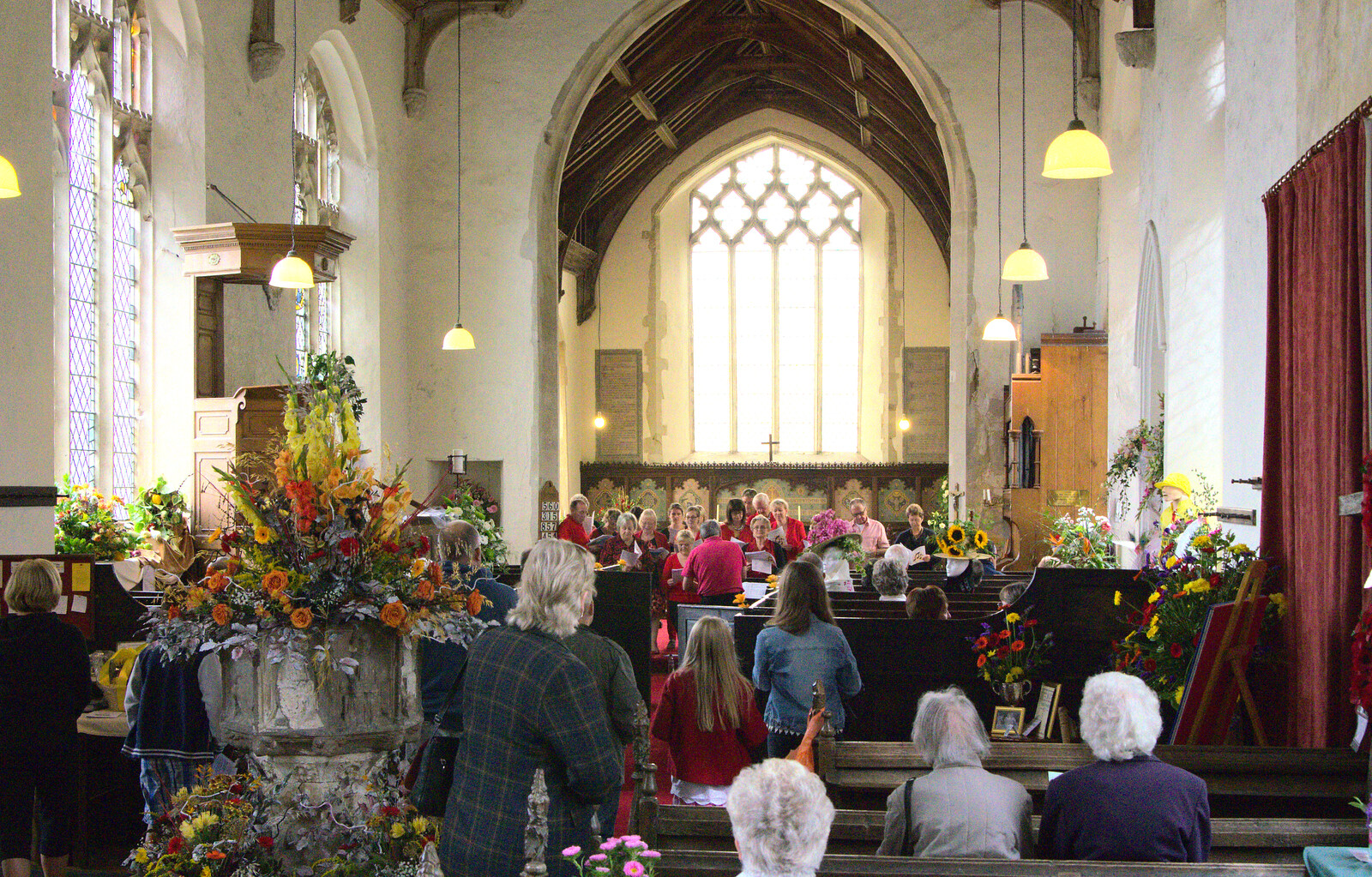 A view of the choir from the back of the church from The Oaksmere, and the Gislingham Flower Festival, Suffolk - 24th August 2014