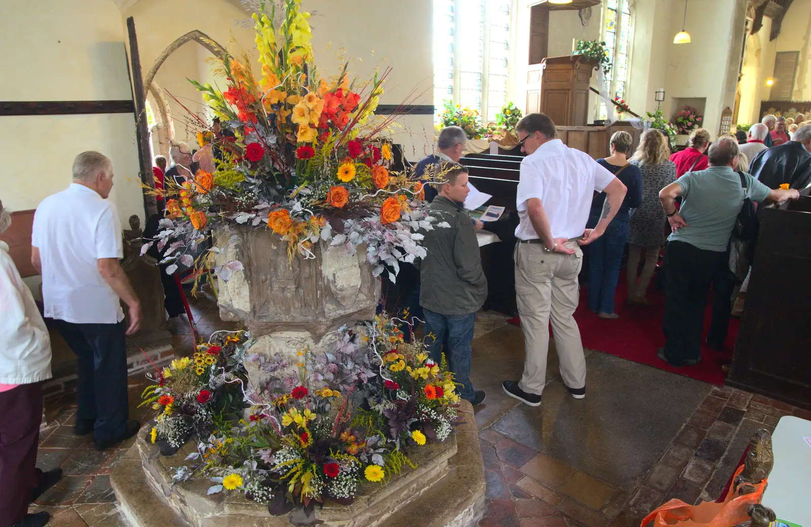 A huge flower display around the fount, from The Oaksmere, and the Gislingham Flower Festival, Suffolk - 24th August 2014