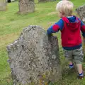 Harry leans on a gravestone, The Oaksmere, and the Gislingham Flower Festival, Suffolk - 24th August 2014