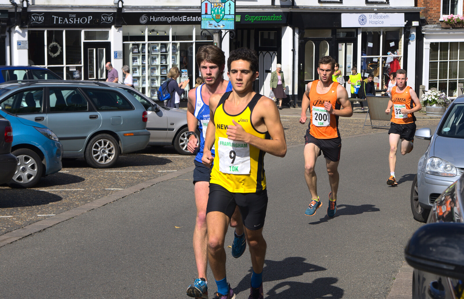 The first of the serious runners comes through from The Framlingham 10k Run, Suffolk - 31st August 2014