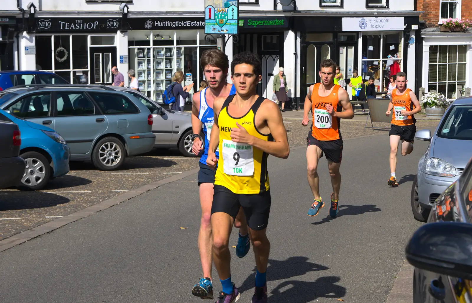 The first of the serious runners comes through, from The Framlingham 10k Run, Suffolk - 31st August 2014