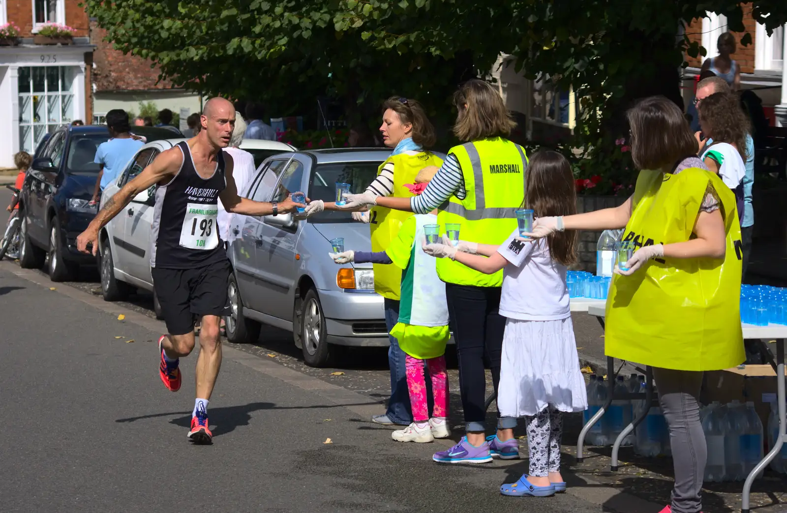 Water is grabbed, from The Framlingham 10k Run, Suffolk - 31st August 2014