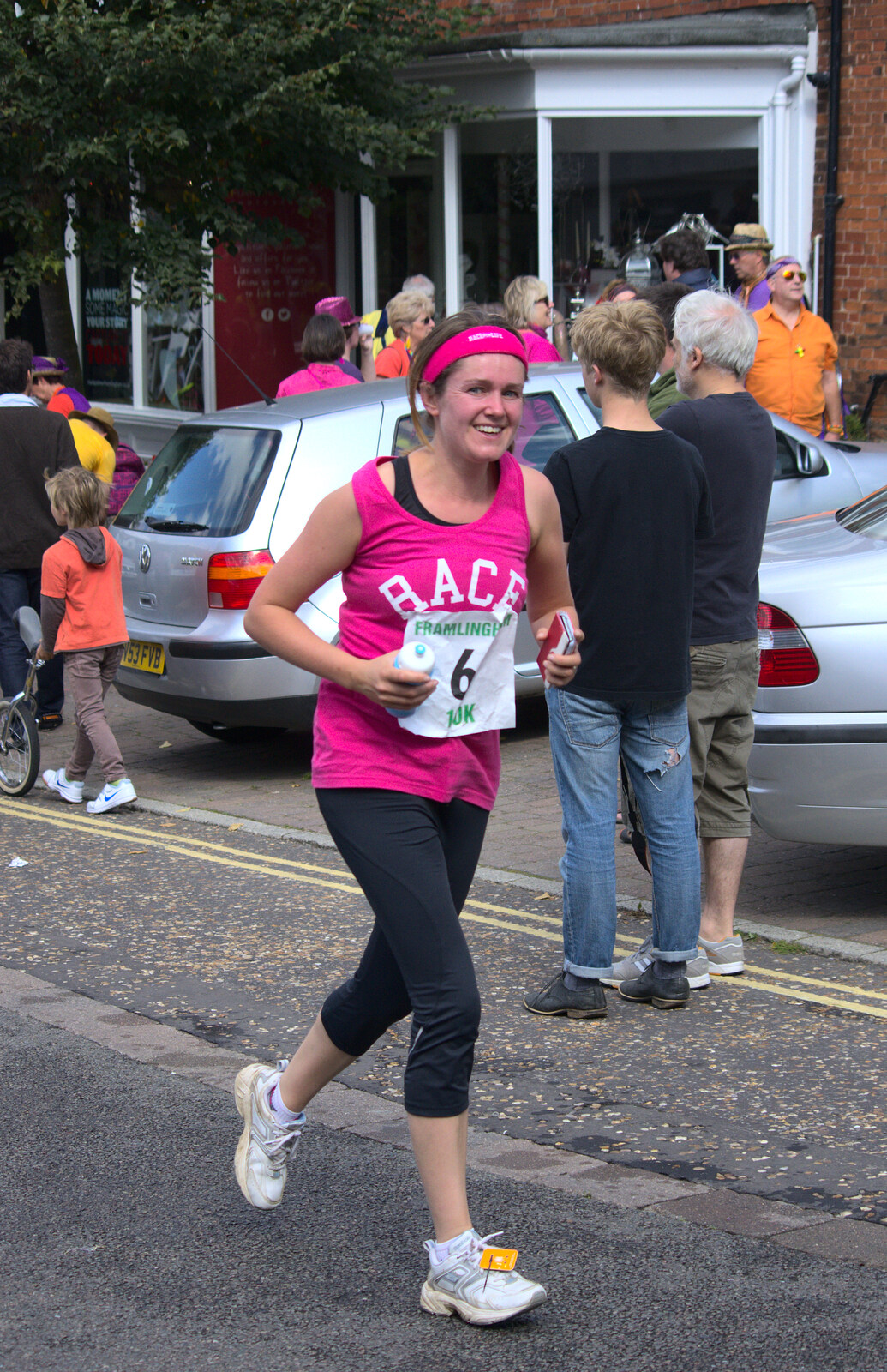 Isobel clutches Fred's cycle bottle from The Framlingham 10k Run, Suffolk - 31st August 2014