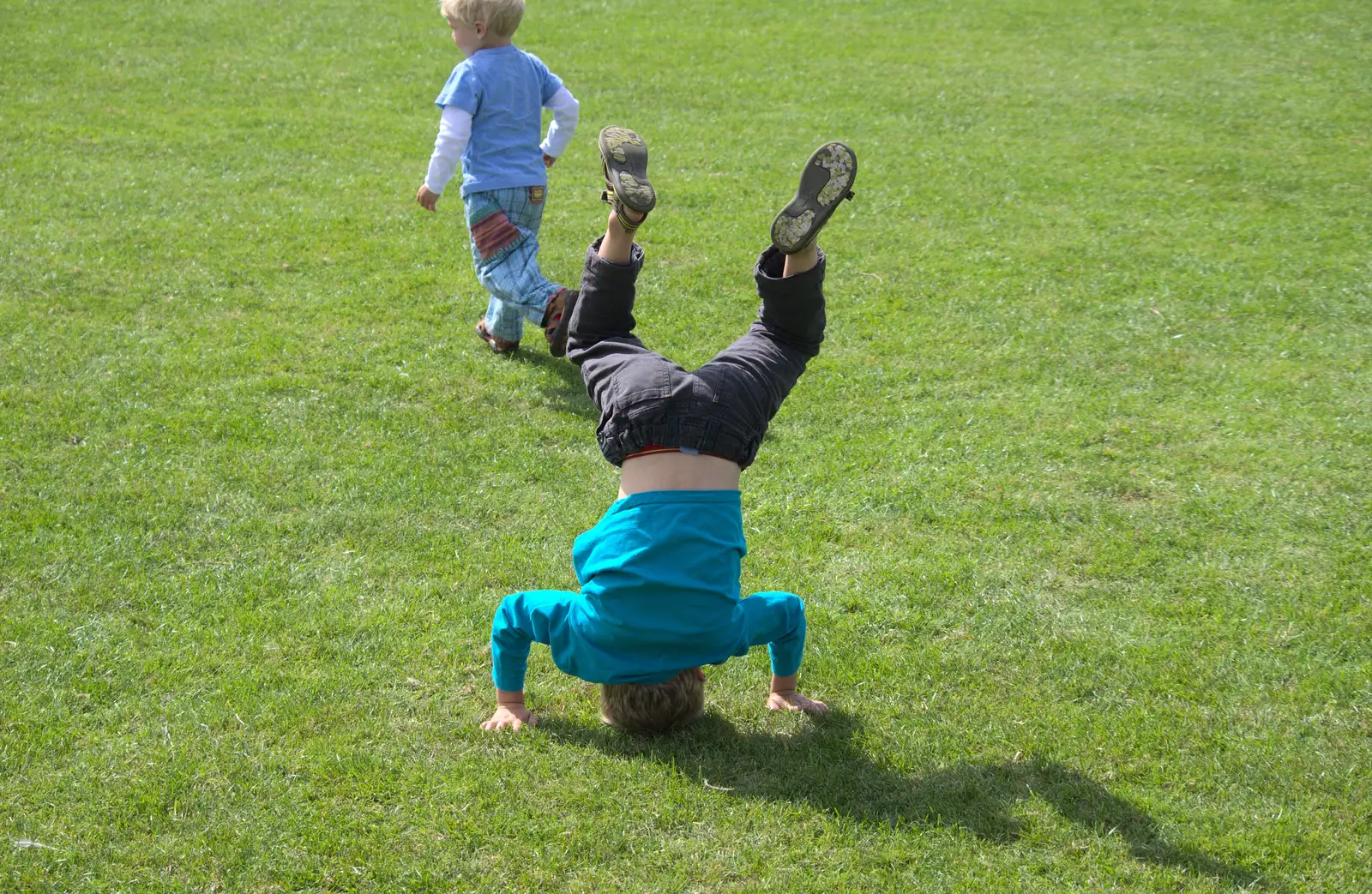 Fred does a hand/head-stand, from The Framlingham 10k Run, Suffolk - 31st August 2014