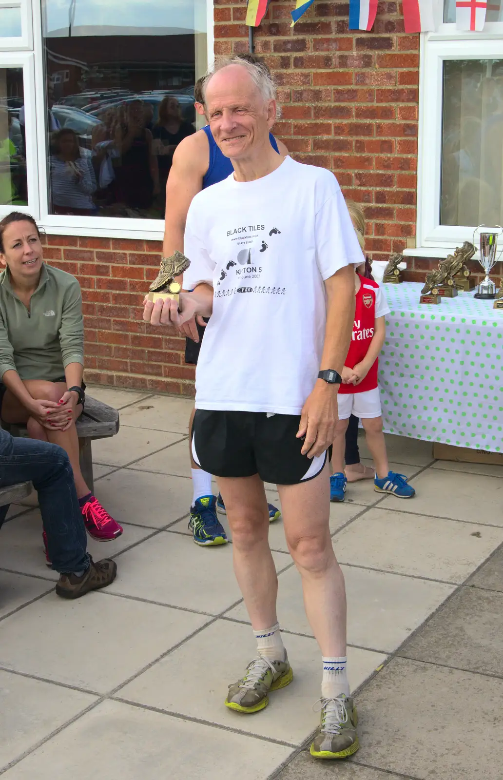 Some dude wins a prize, from The Framlingham 10k Run, Suffolk - 31st August 2014