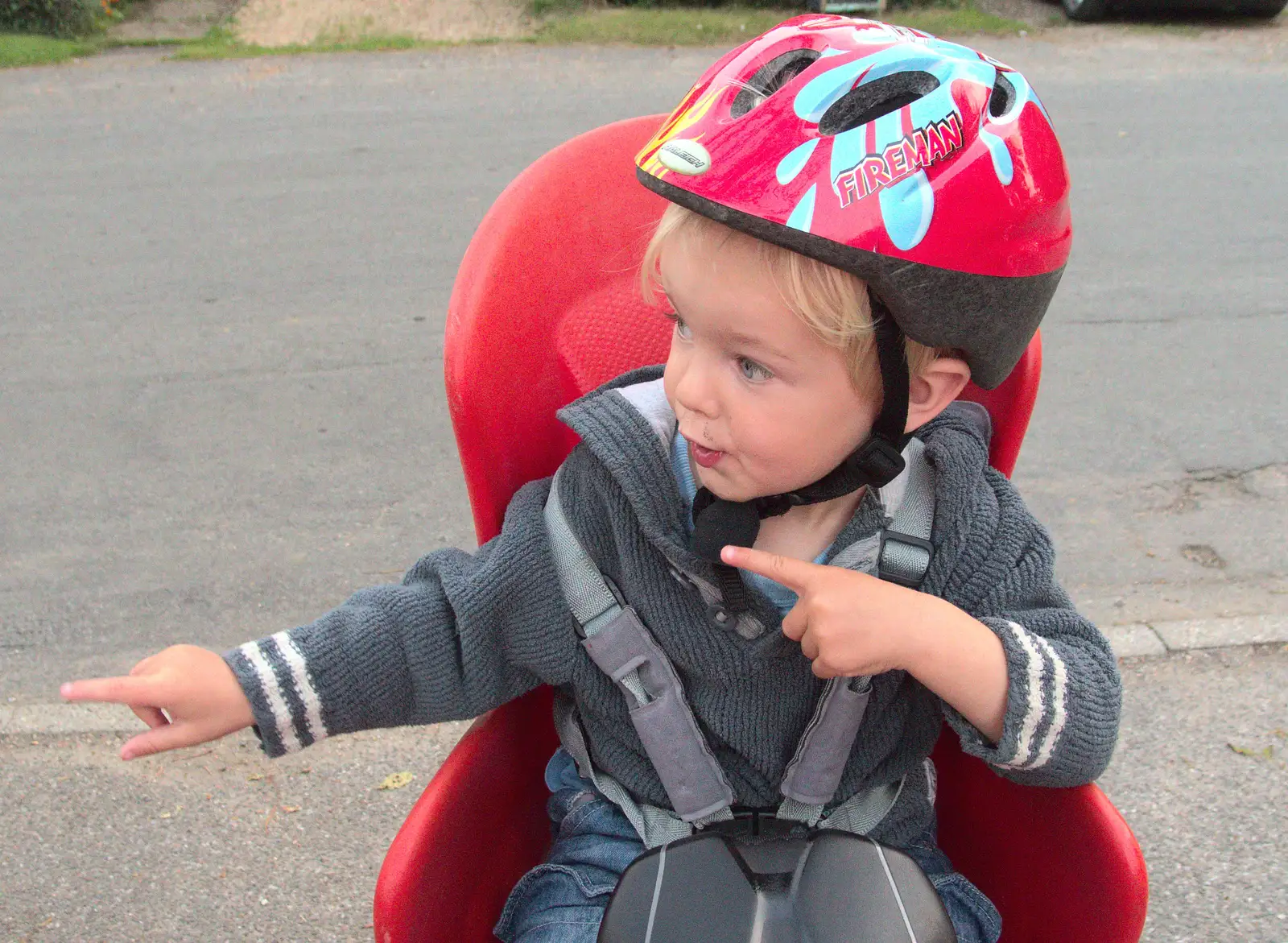 Harry points up the road, from Bike Rides and the BSCC at the Railway, Mellis and Brome, Suffolk - 18th September 2014