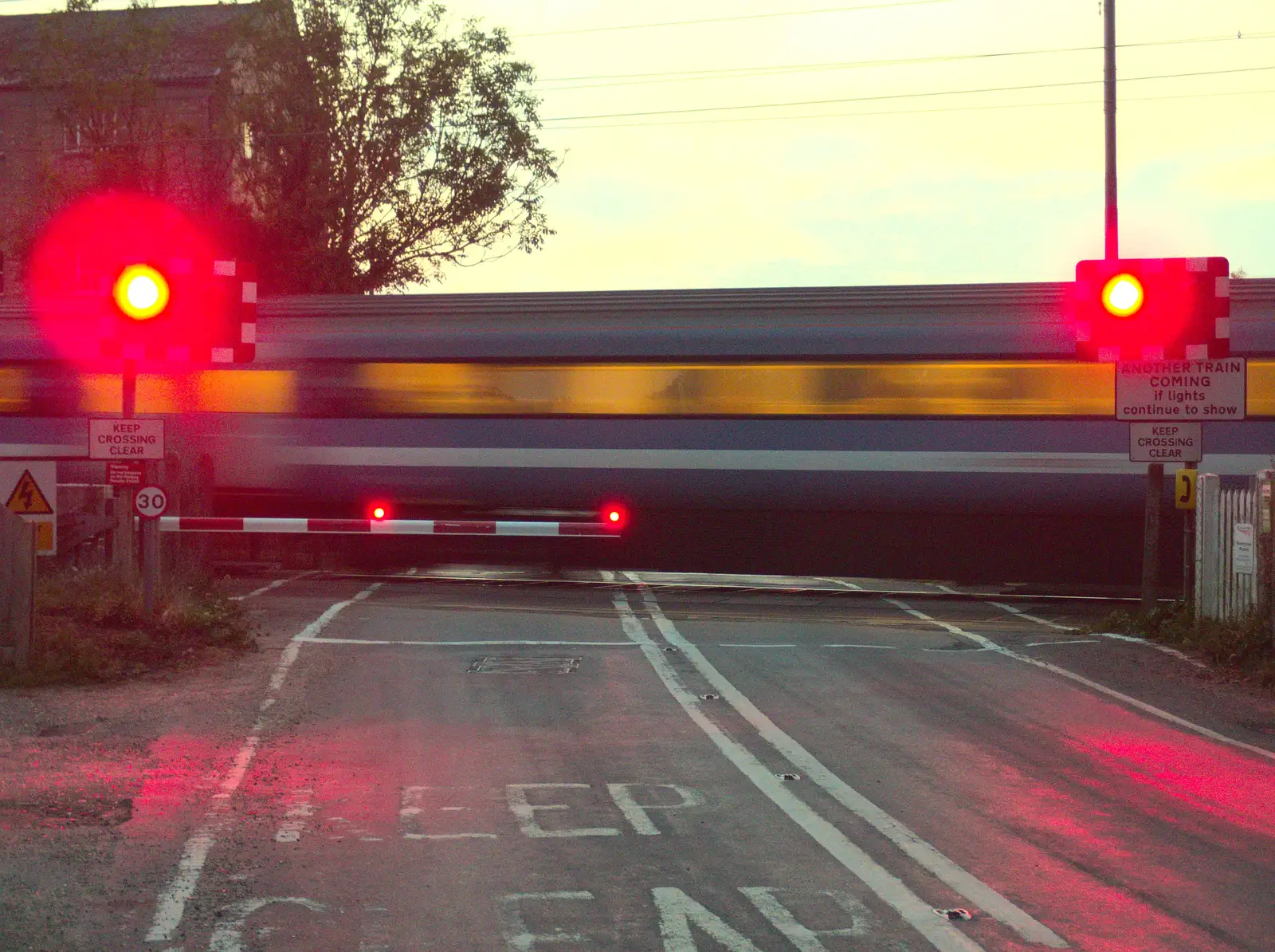 An InterCity thunders through the crossing, from Bike Rides and the BSCC at the Railway, Mellis and Brome, Suffolk - 18th September 2014