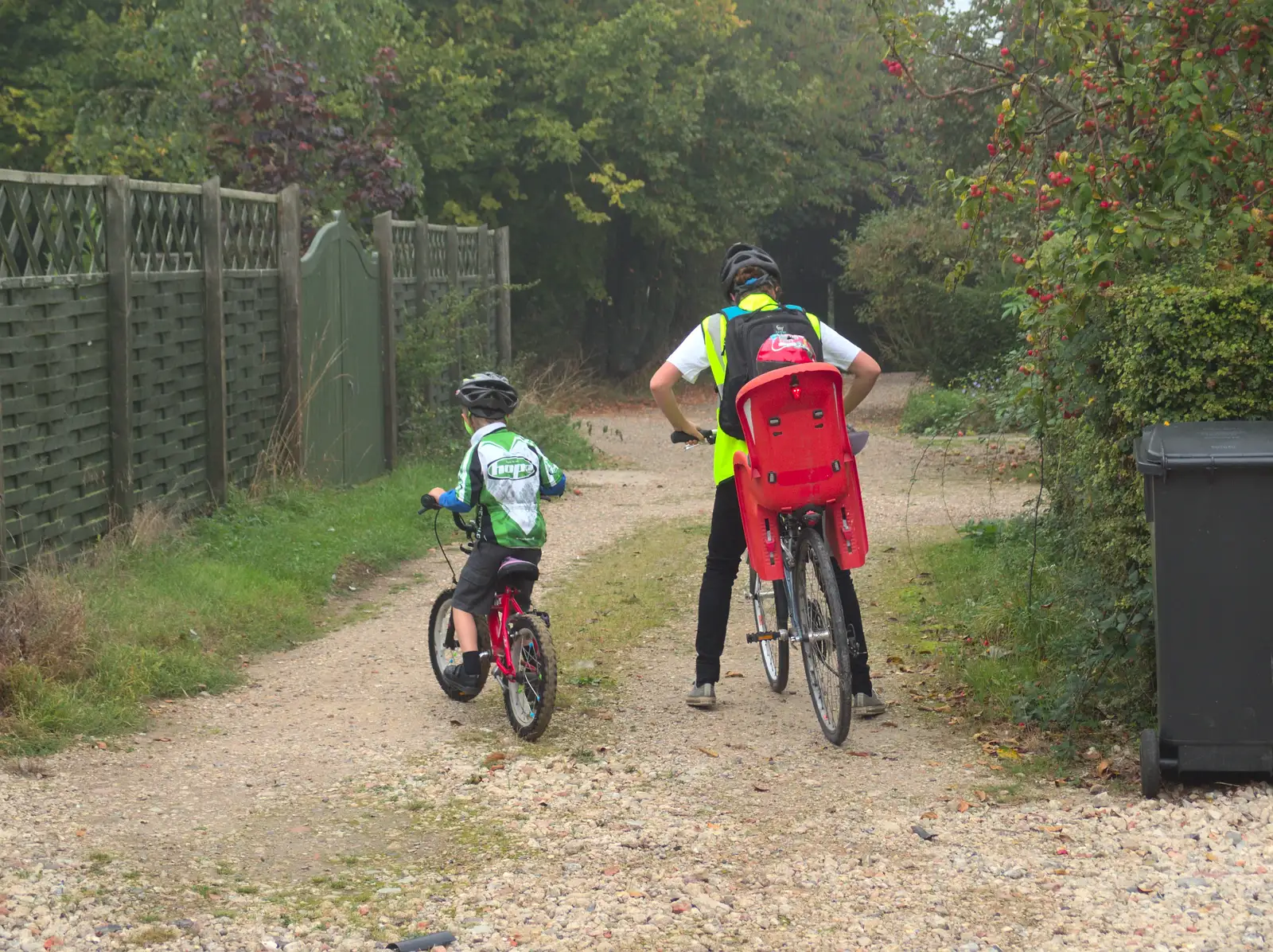 Fred and Isobel head off down the drive, from Bike Rides and the BSCC at the Railway, Mellis and Brome, Suffolk - 18th September 2014