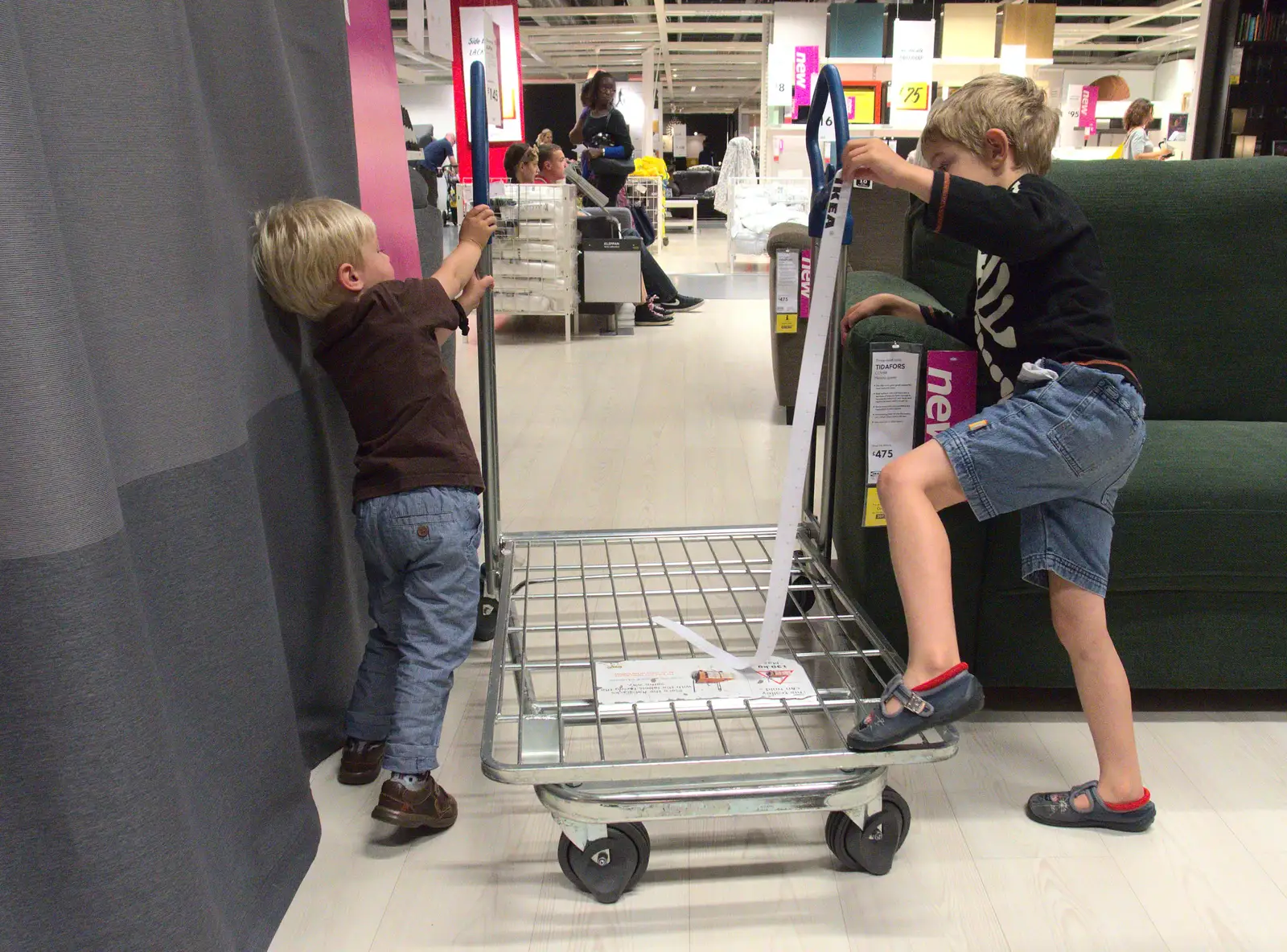 Harry and Fred mess around in Ikea, from New Railway and a Trip to Ikea, Ipswich and Thurrock - 19th September 2014