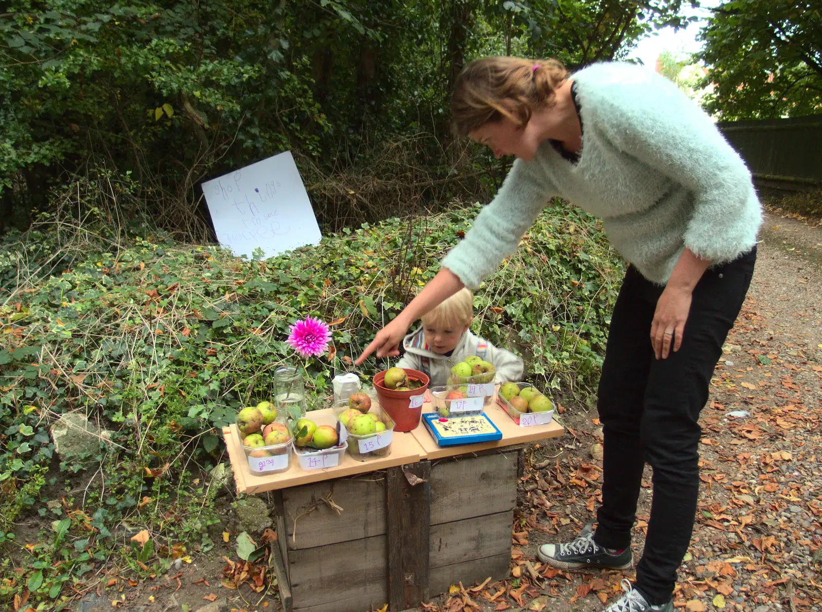 Isobel points to stuff, from Fred's Shop, Brome, Suffolk - 20th September 2014