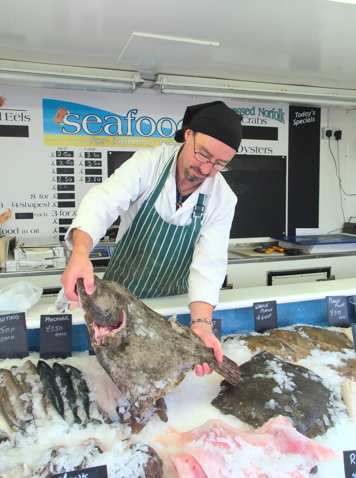 The fish dude shows off a massive Turbot, from A House Built of Wax and Diss Randomness, Southwark Street, London - 30th September 2014