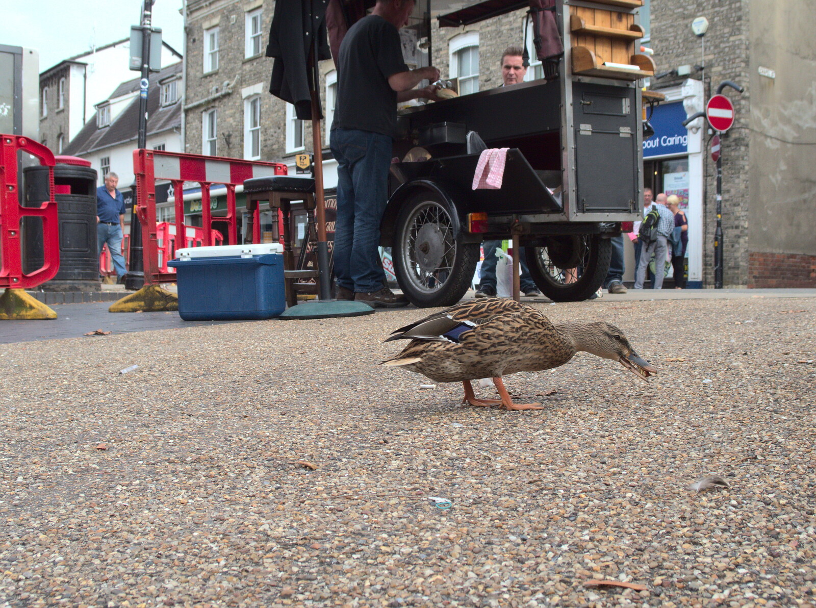 A duck pecks at stuff near Andy Sausage's van from A House Built of Wax and Diss Randomness, Southwark Street, London - 30th September 2014
