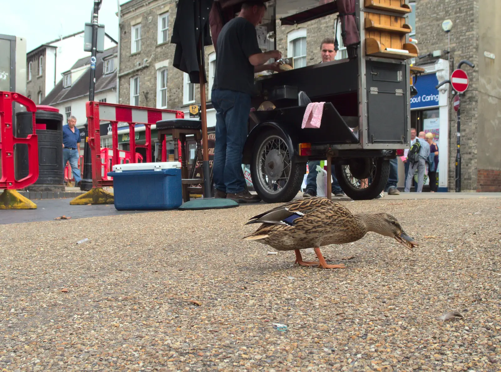 A duck pecks at stuff near Andy Sausage's van, from A House Built of Wax and Diss Randomness, Southwark Street, London - 30th September 2014