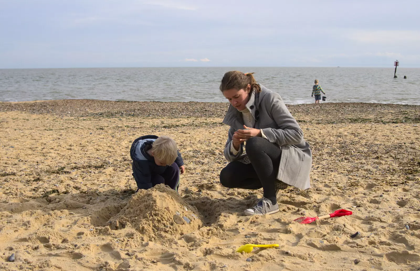 Harry digs a hole, from On The Beach Again, Southwold, Suffolk - 12th October 2014