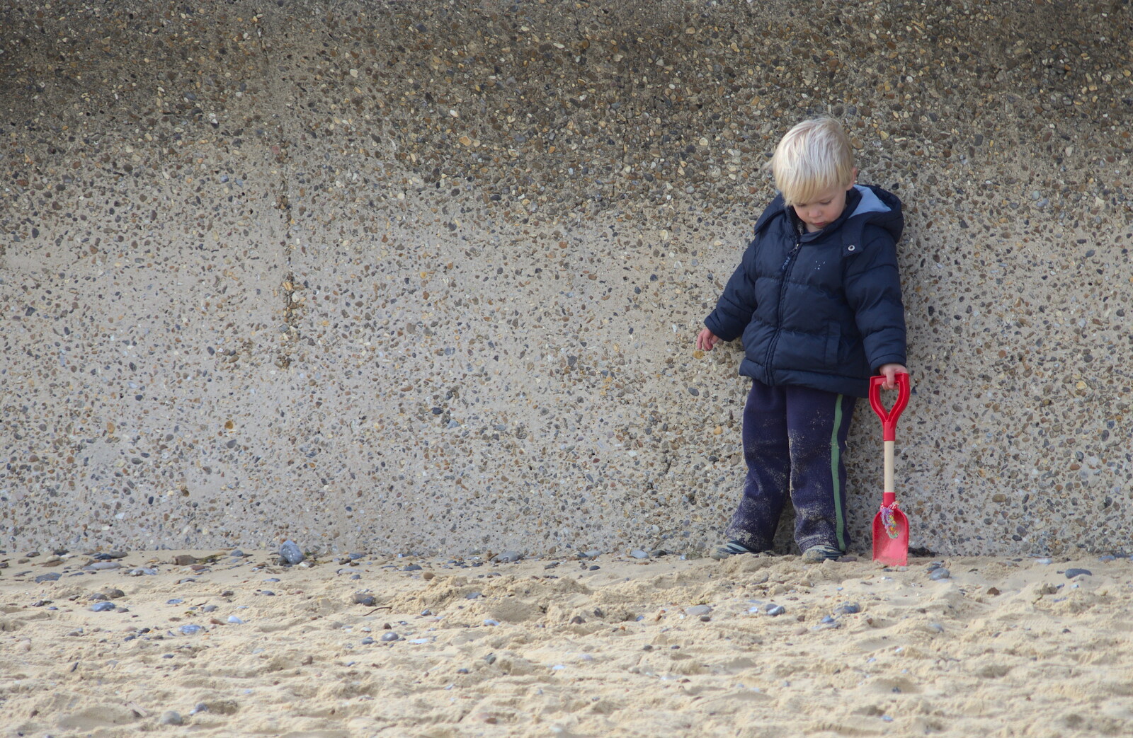 Harry pokes the sand with a spade from On The Beach Again, Southwold, Suffolk - 12th October 2014