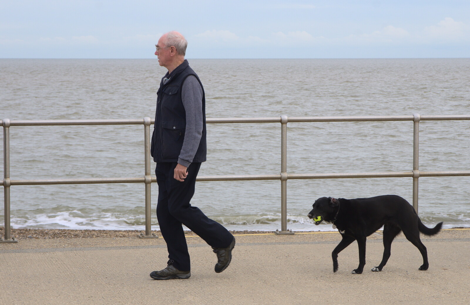 A bloke with his dog from On The Beach Again, Southwold, Suffolk - 12th October 2014