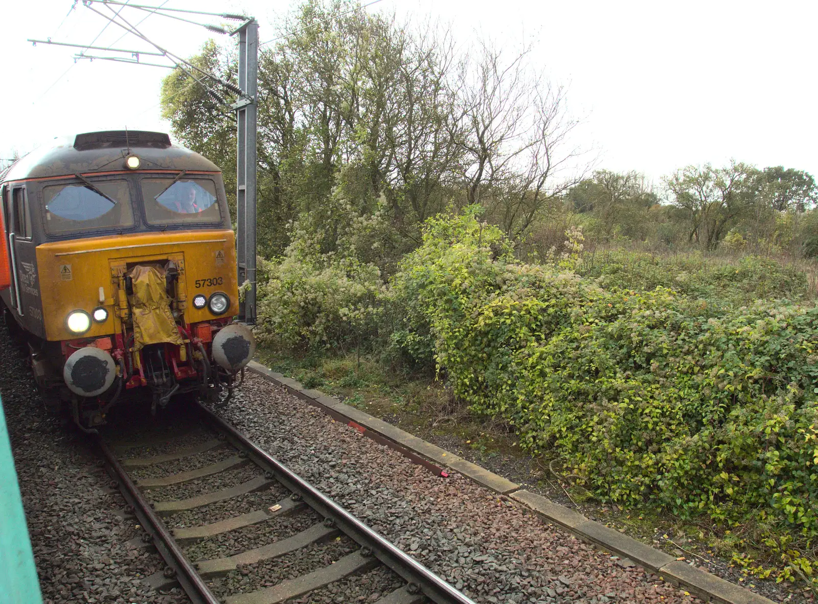 Class 57 57303 rumbles by, from (Very) Long Train (Not) Running, Stowmarket, Suffolk - 21st October 2014