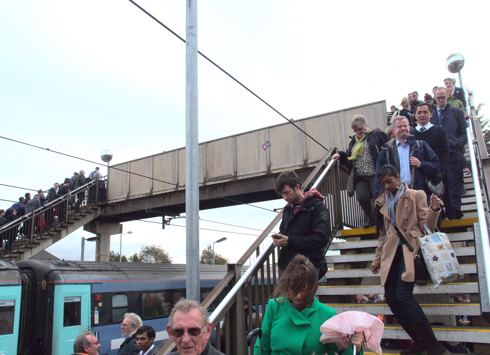 A stream of people cross the bridge from (Very) Long Train (Not) Running, Stowmarket, Suffolk - 21st October 2014