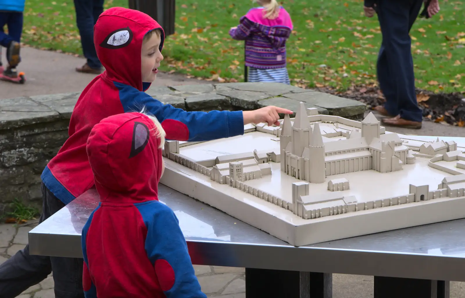 The boys look a model of the original abbey site, from A Trip to Abbey Gardens, Bury St. Edmunds, Suffolk - 29th October 2014