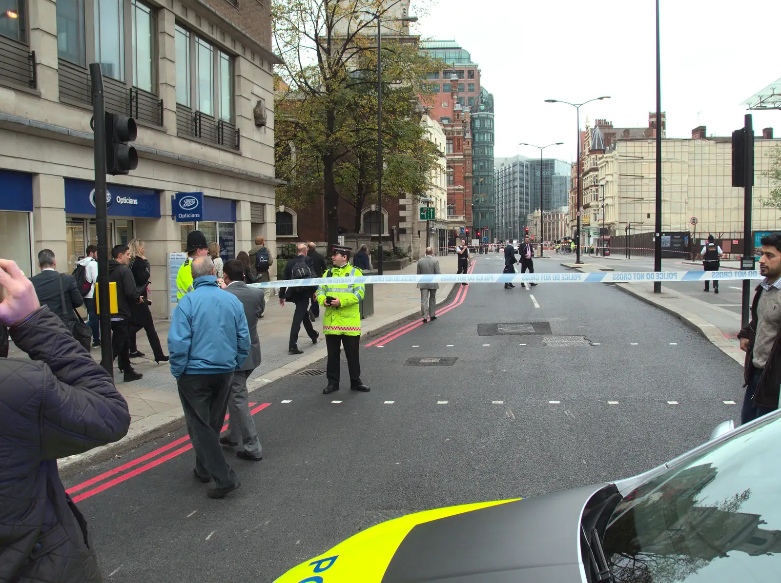 The police allow walkers up Bishopsgate, from A Bomb Scare and Fred Does Building, London and Suffolk - 30th October 2014