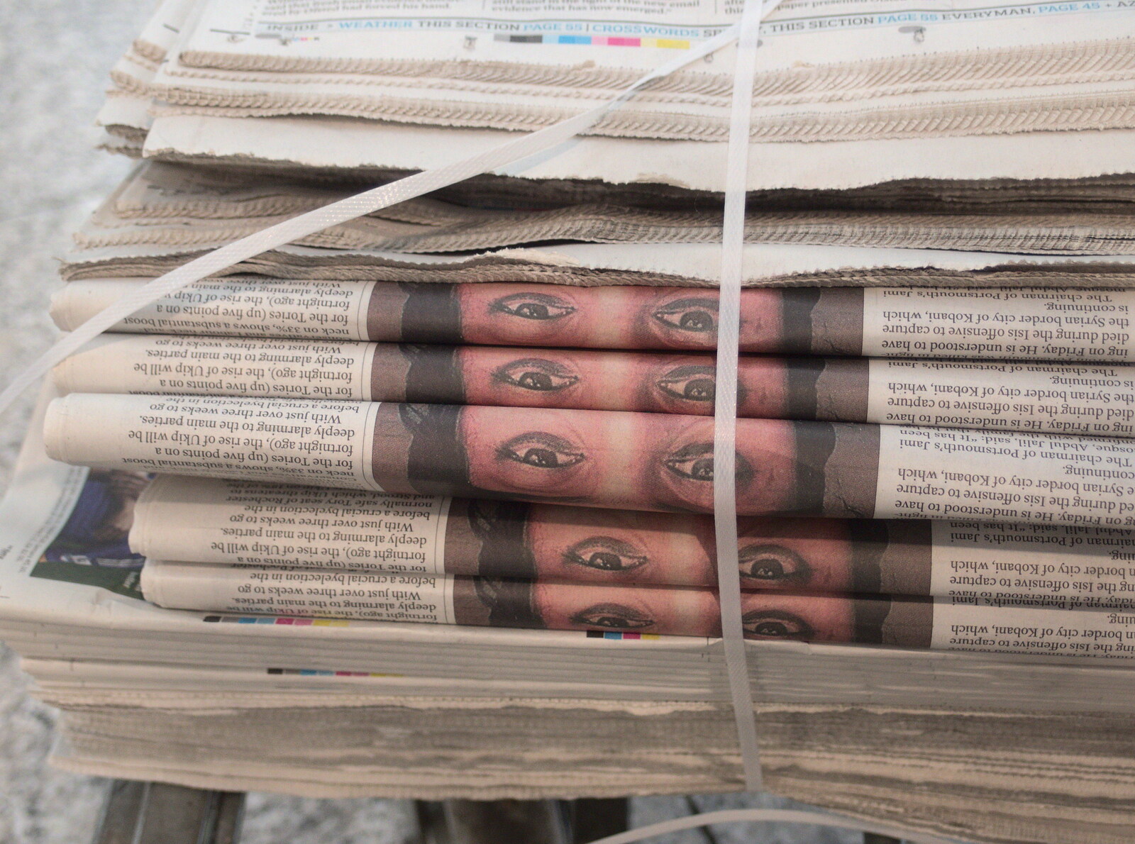 Loads of eyes stare out from a stack of newspapers from A Bomb Scare and Fred Does Building, London and Suffolk - 30th October 2014