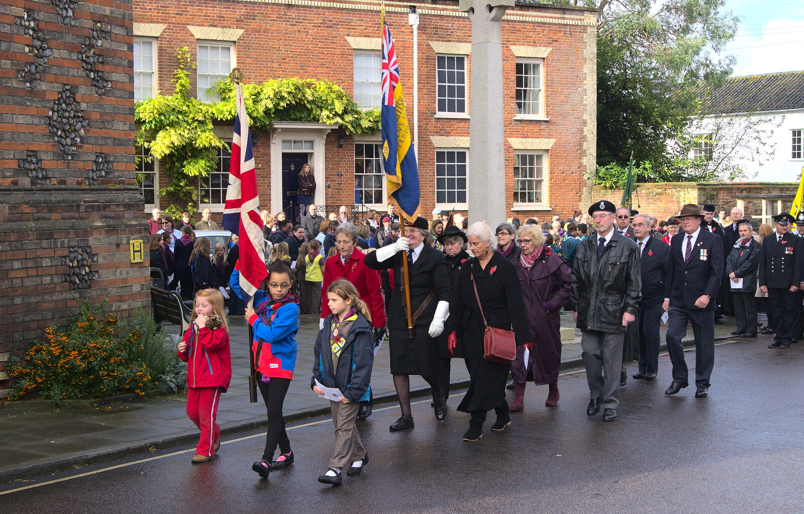 The parade continues on towards the church from A Remembrance Sunday Parade, Eye, Suffolk - 9th November 2014