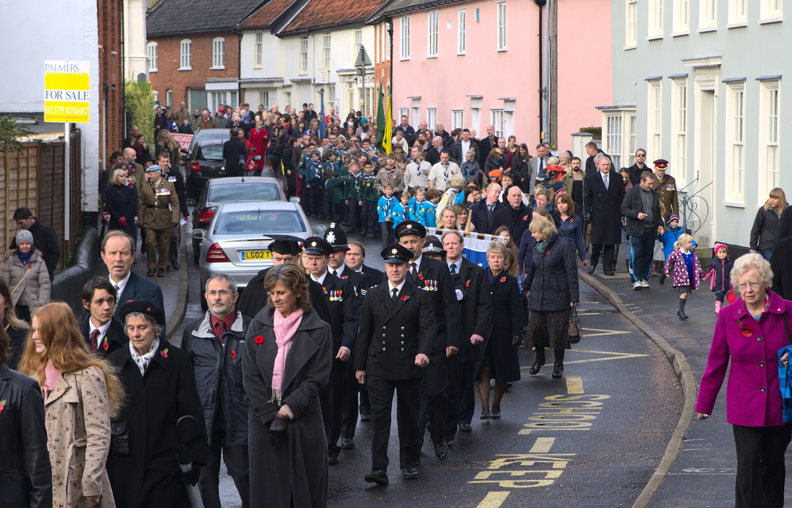 A good turn out fills Church Street from A Remembrance Sunday Parade, Eye, Suffolk - 9th November 2014