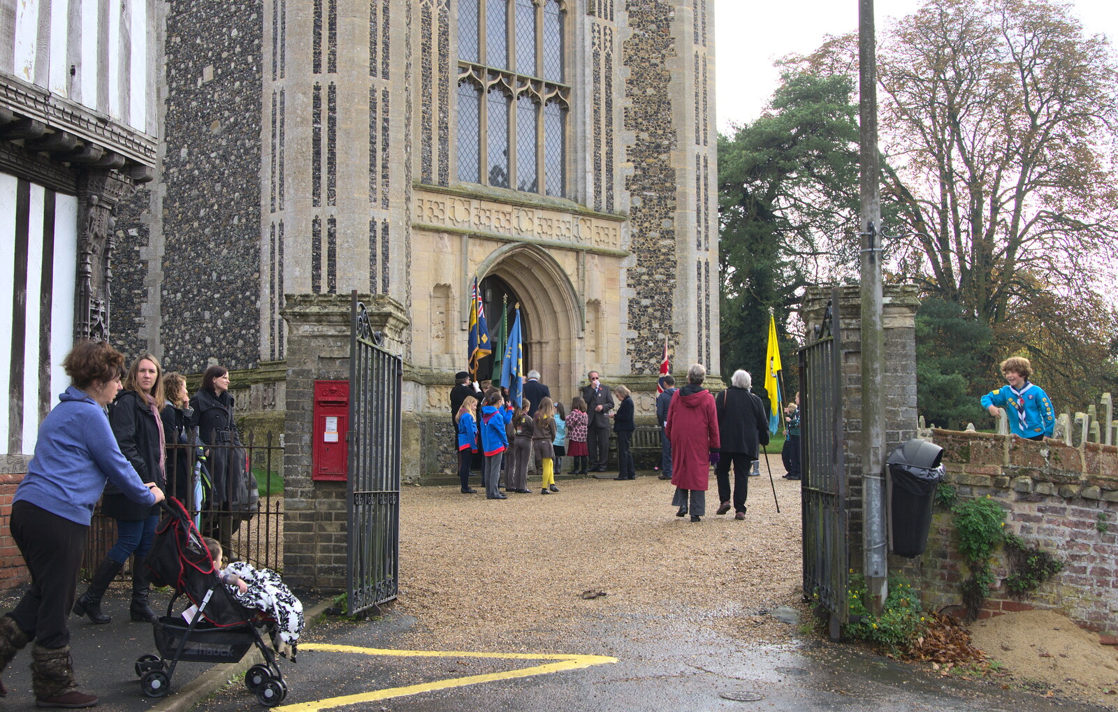 Hanging around outside the church from A Remembrance Sunday Parade, Eye, Suffolk - 9th November 2014