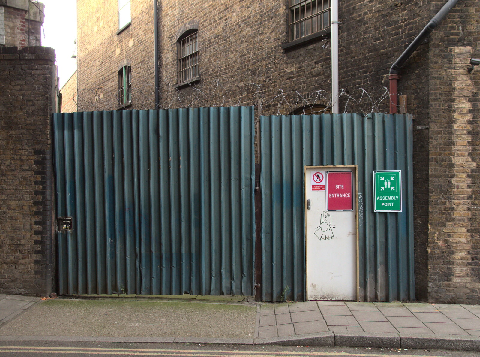 A barb-wired gate on O'Meara Street from A Melting House Made of Wax, Southwark, London - 12th November 2014