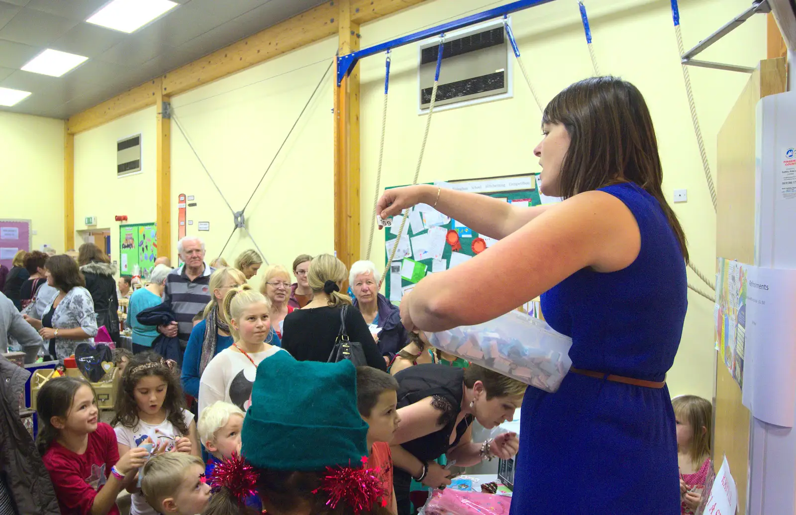 A raffle is occuring, from November Singing, Gislingham Primary School, Suffolk - 17th November 2014