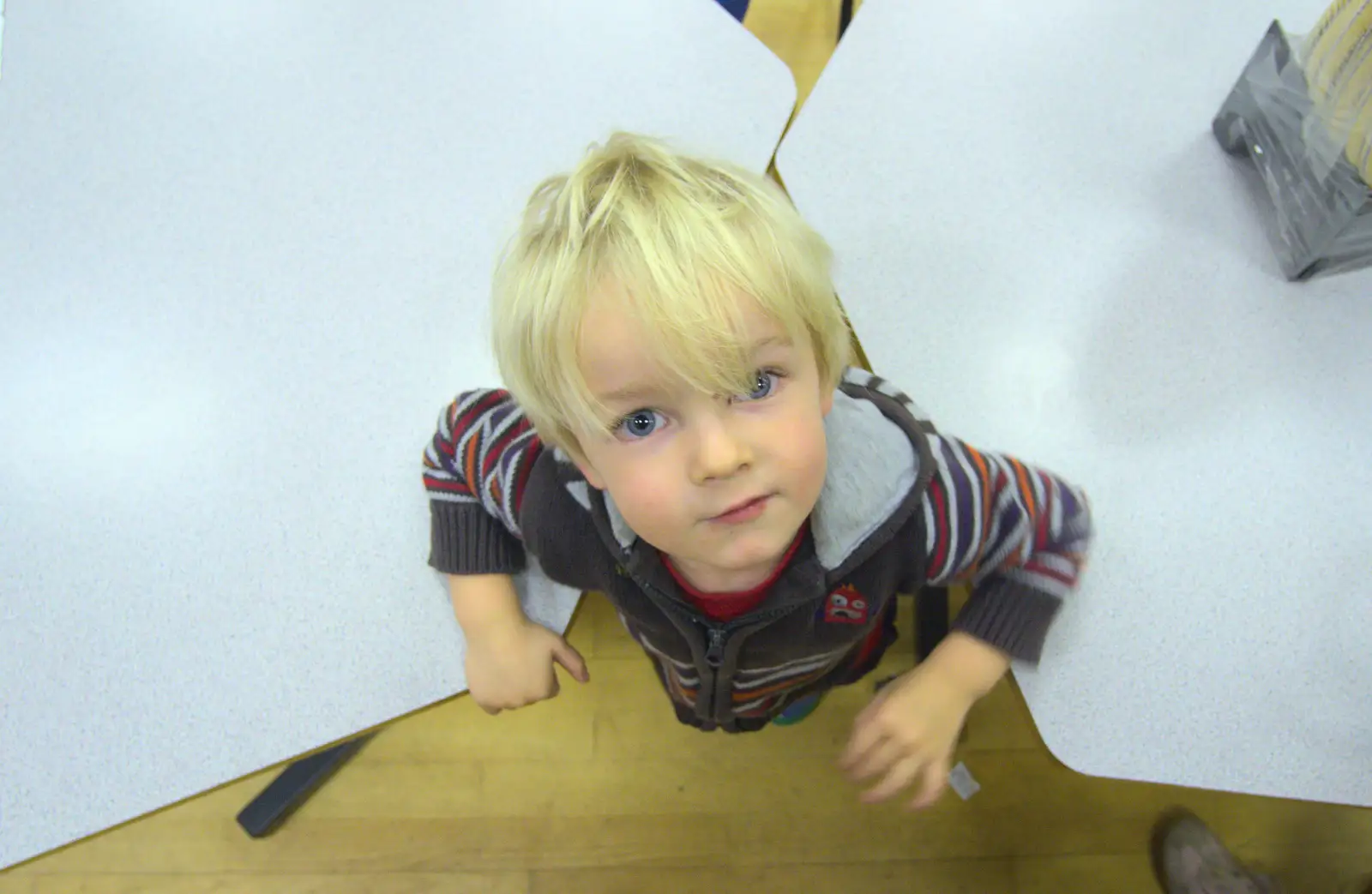 Harry messes about amongst the tables, from November Singing, Gislingham Primary School, Suffolk - 17th November 2014