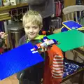 Fred shows off his rather impressive Lego satellite, November Singing, Gislingham Primary School, Suffolk - 17th November 2014