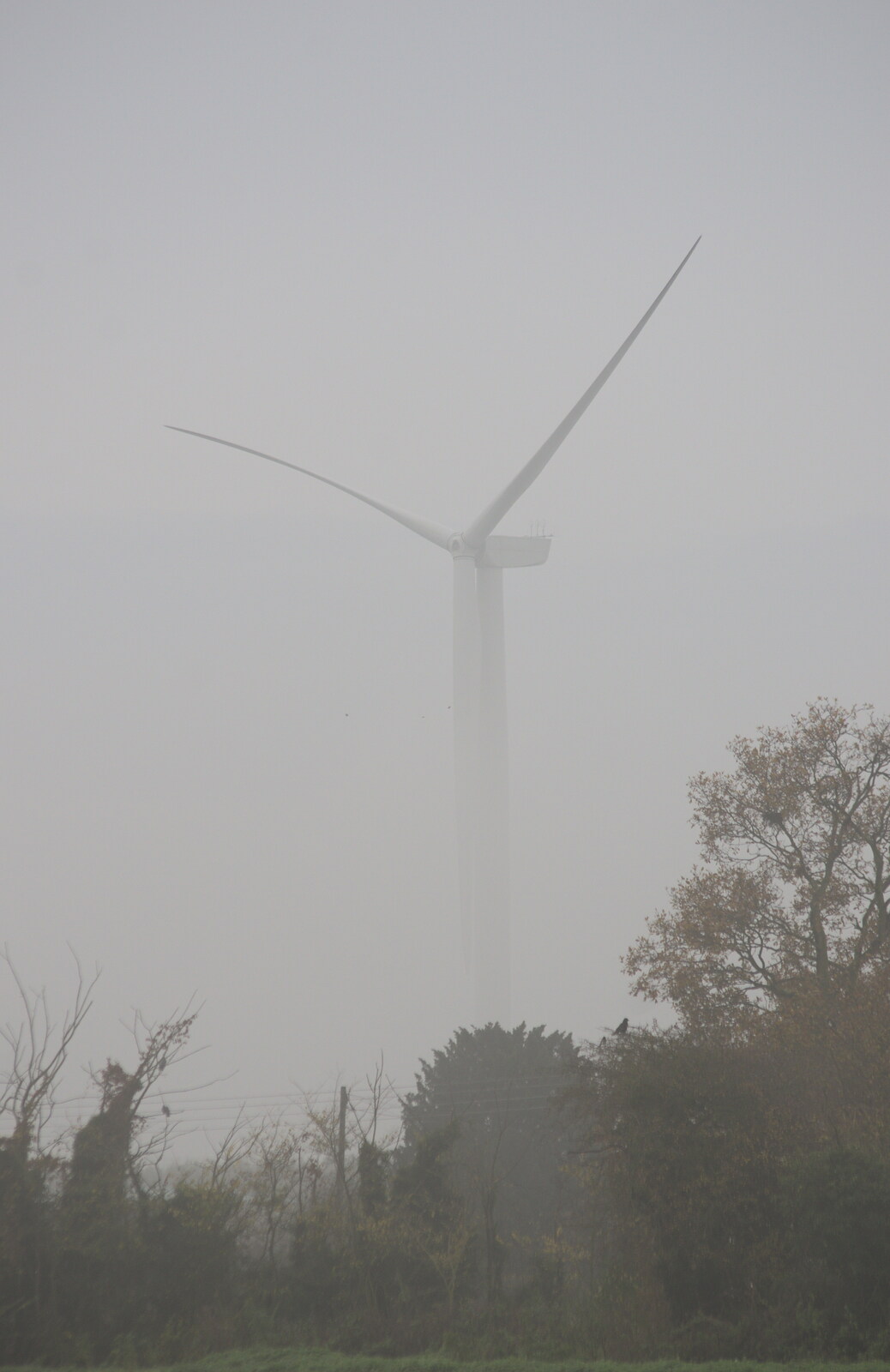 A wind turbine looms out of the mist from November Singing, Gislingham Primary School, Suffolk - 17th November 2014
