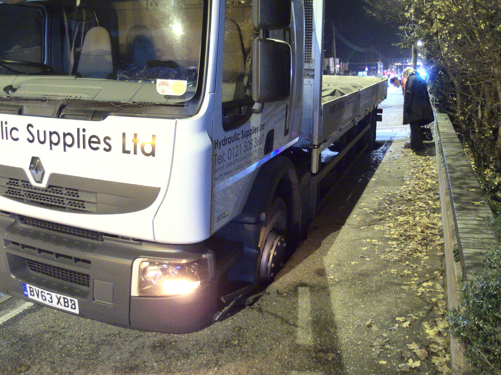 The lorry has both wheels sunk in to the pavement from The Lorry-Eating Pavement of Diss, Norfolk - 3rd December