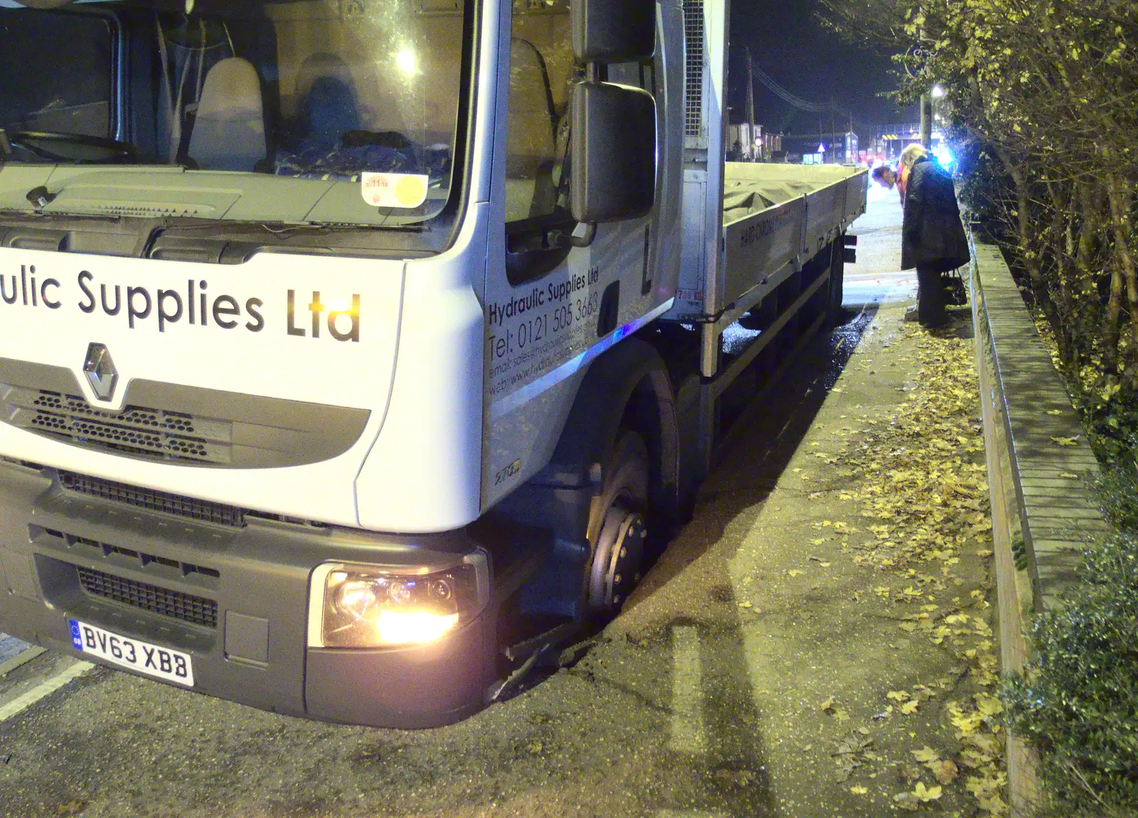 The lorry has both wheels sunk in to the pavement, from The Lorry-Eating Pavement of Diss, Norfolk - 3rd December