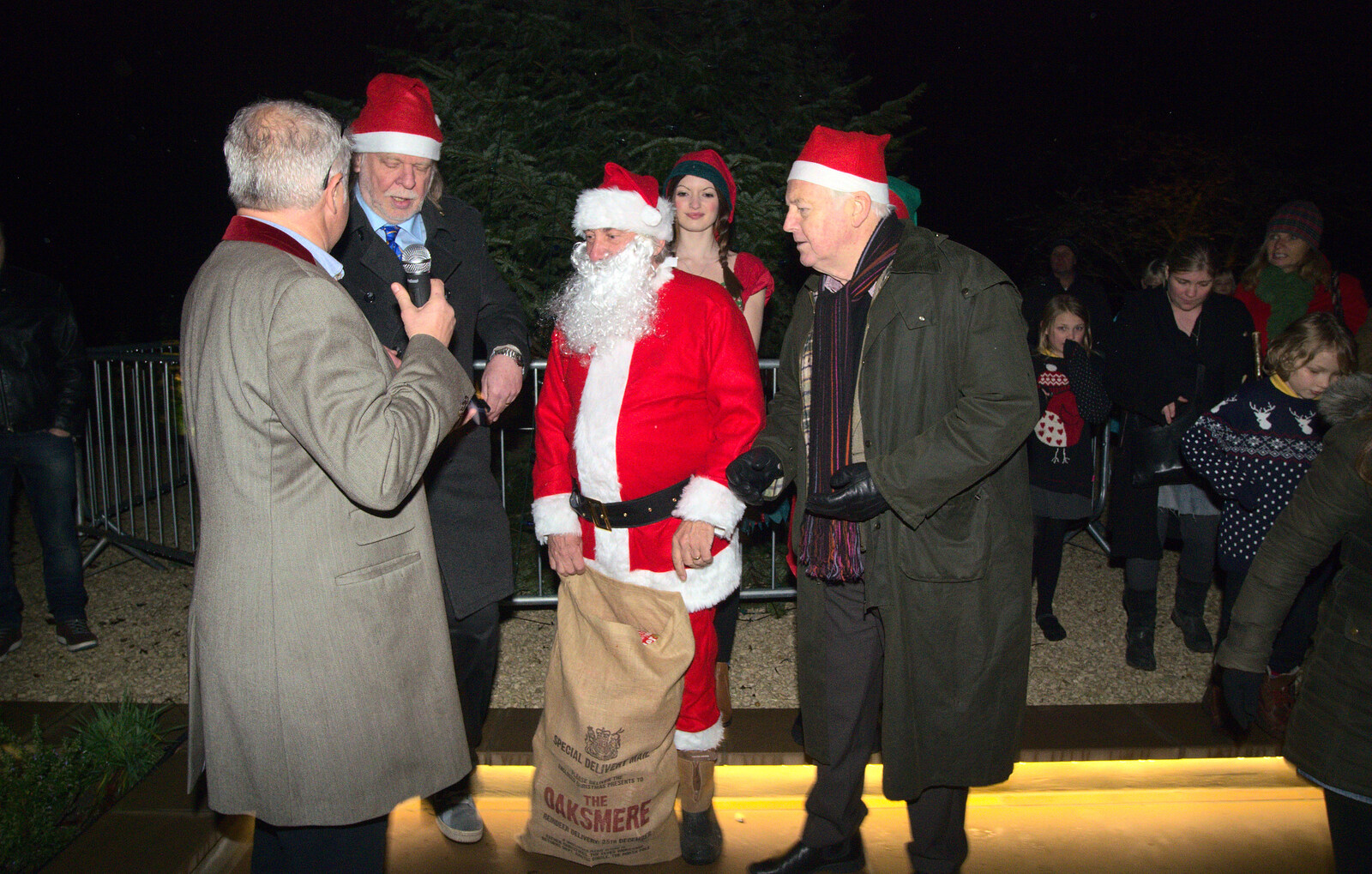 Santa has a sack of presents from Rick Wakeman, Ian Lavender and the Christmas lights, The Oaksmere, Suffolk - 4th December 2014