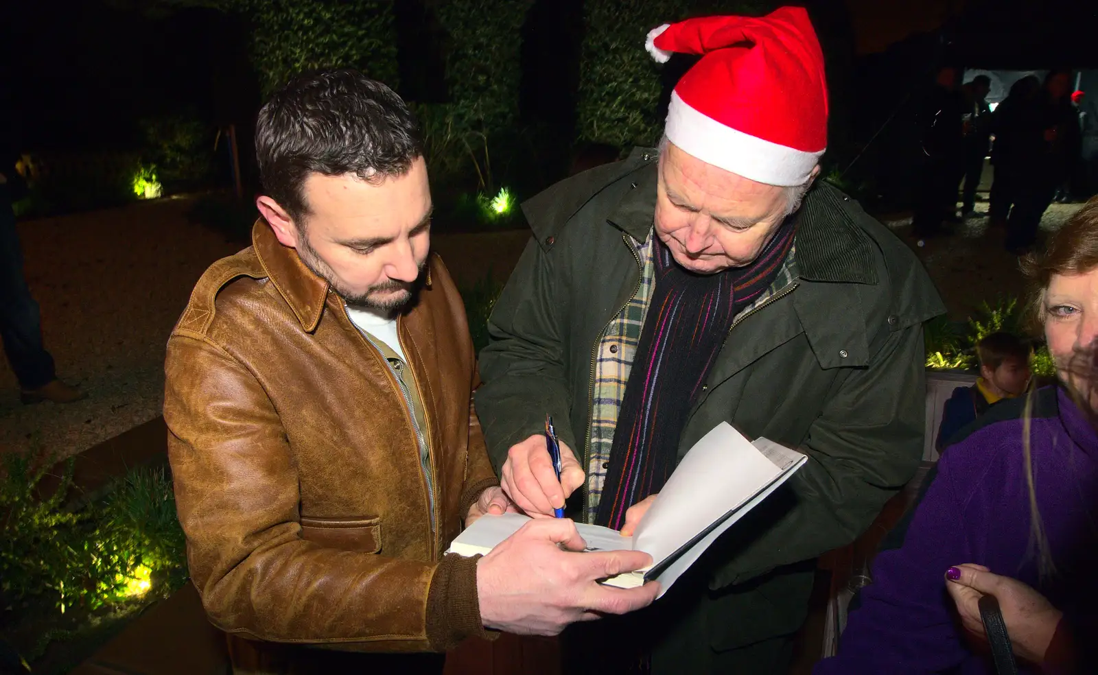 Clive gets a book signed by Ian Lavender, from Rick Wakeman, Ian Lavender and the Christmas lights, The Oaksmere, Suffolk - 4th December 2014