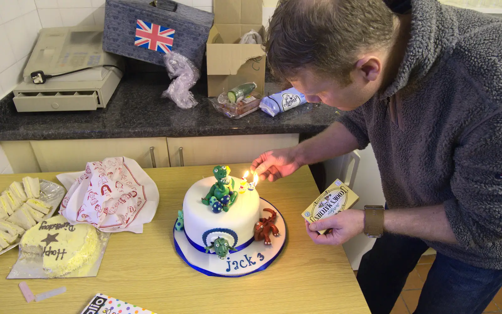 Mikey P lights the candles on Jack's cake, from The Eye Lights and a Thorpe Abbots Birthday, Suffolk and Norfolk - 6th December 2014