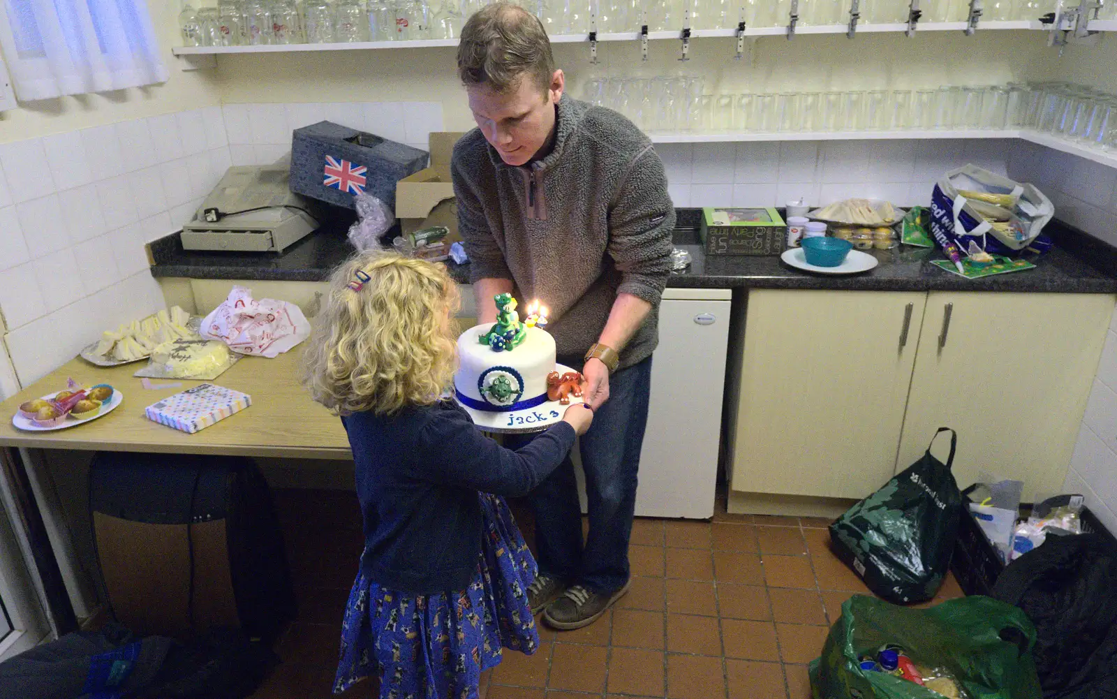 Rosie is given the job of cake delivery, from The Eye Lights and a Thorpe Abbots Birthday, Suffolk and Norfolk - 6th December 2014