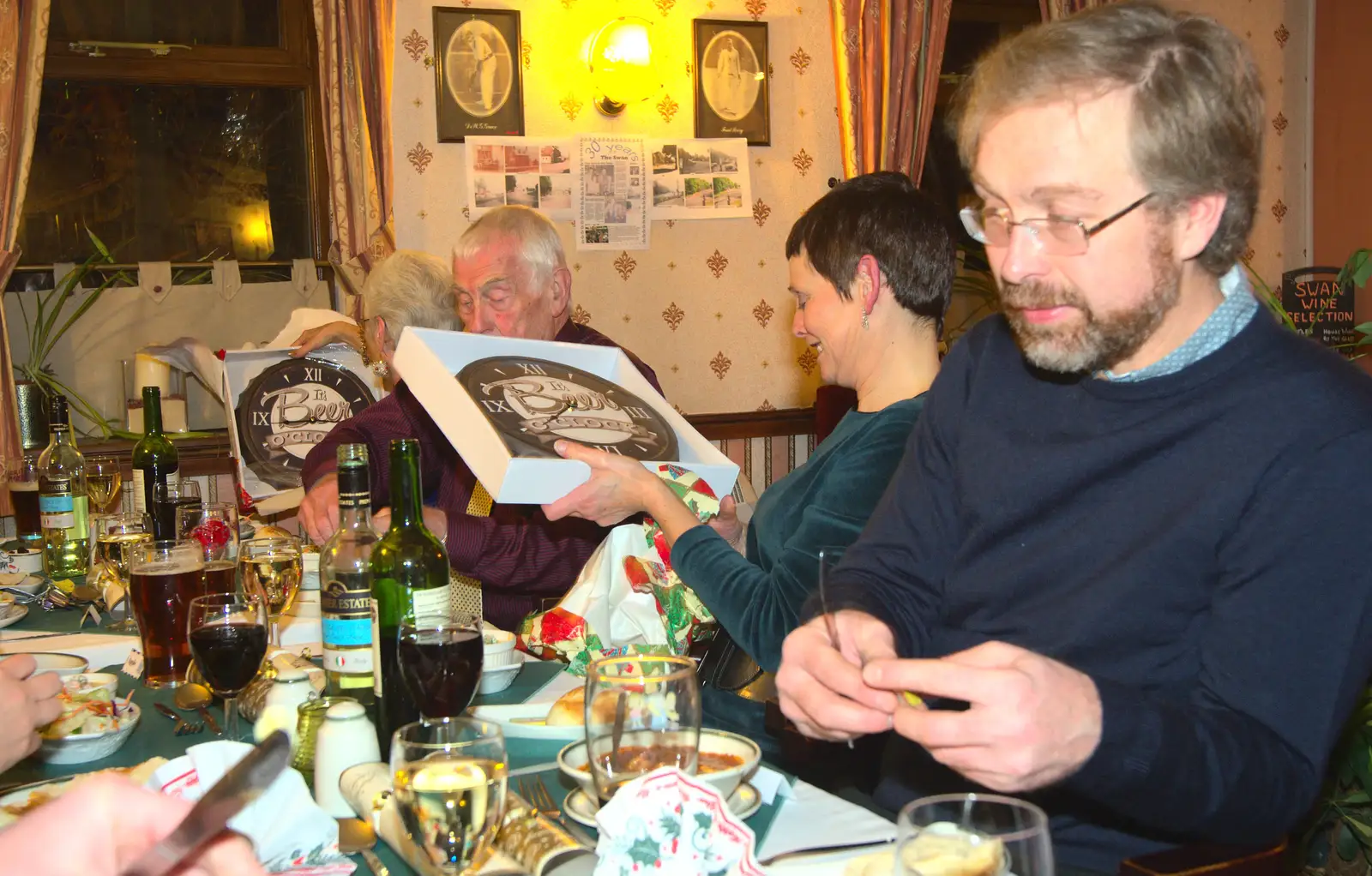 Pippa gets a clock, from The BSCC Christmas Dinner, The Swan Inn, Brome, Suffolk - 6th December 2014