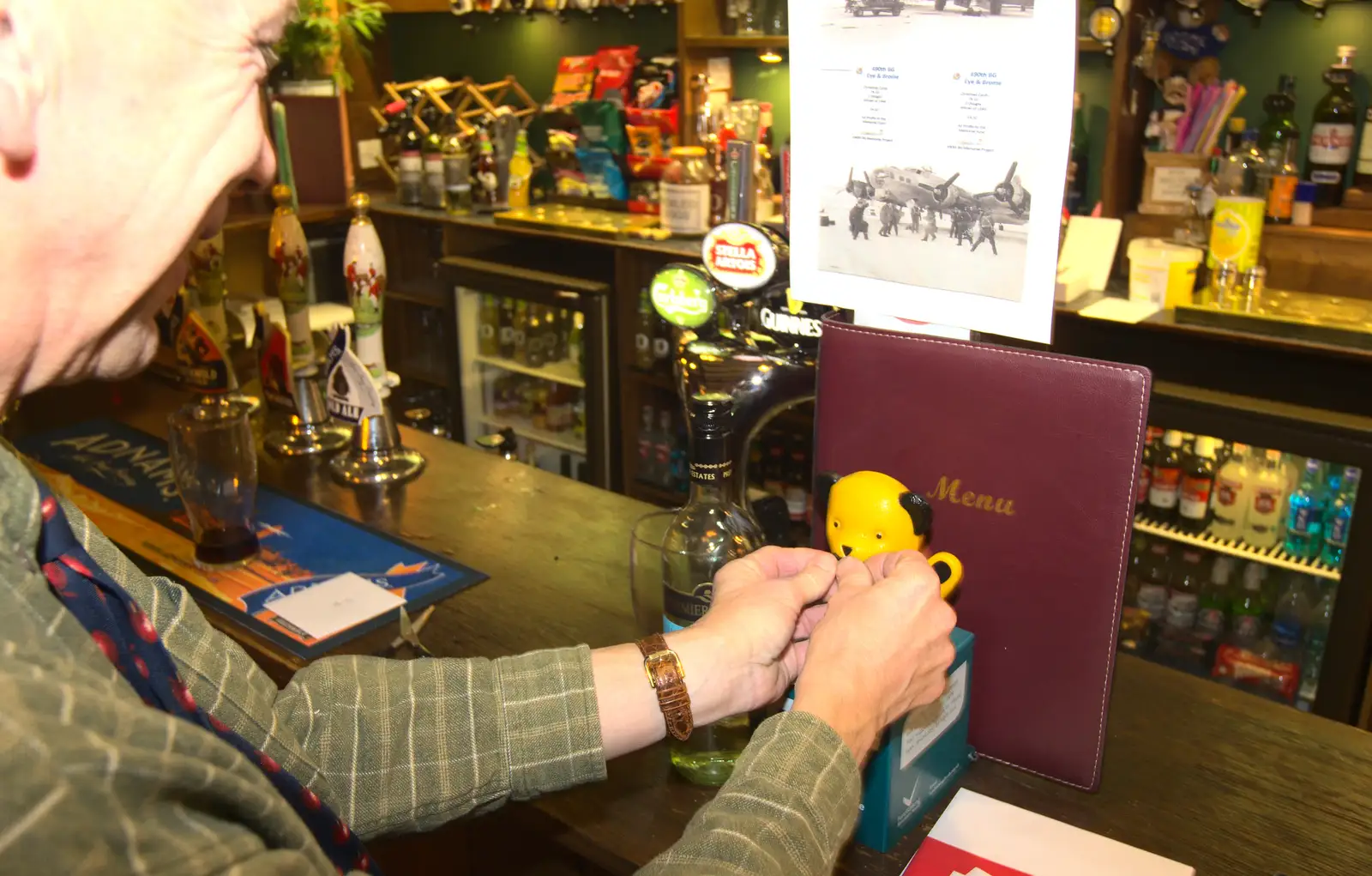 Apple John fiddles about with Sooty, from The BSCC Christmas Dinner, The Swan Inn, Brome, Suffolk - 6th December 2014