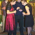 Something's occuring on Marc's phone, The BSCC Christmas Dinner, The Swan Inn, Brome, Suffolk - 6th December 2014