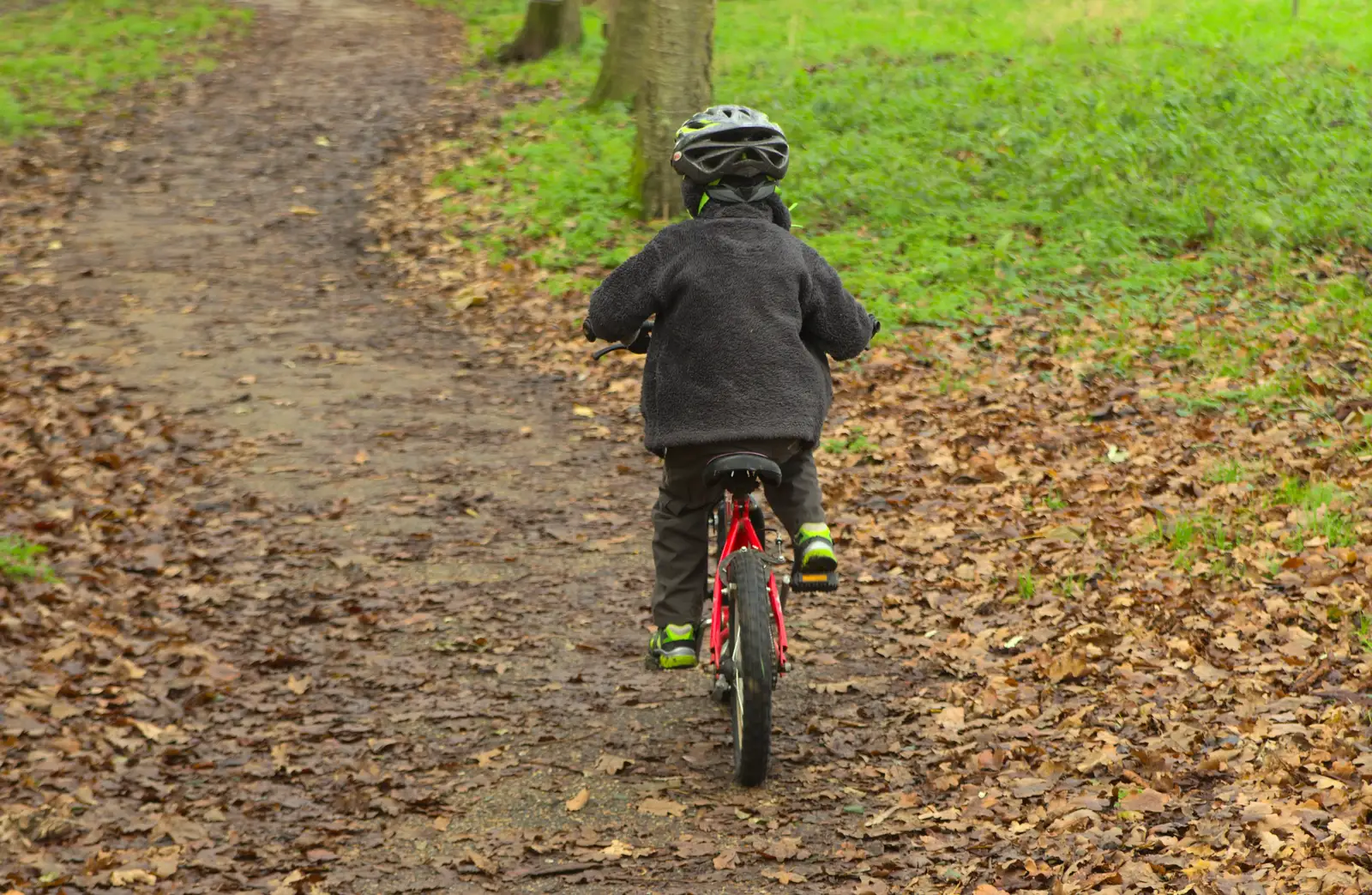 Fred cycles off, from Cameraphone Randomness and a Thornham Walk, Suffolk - 14th December 2014