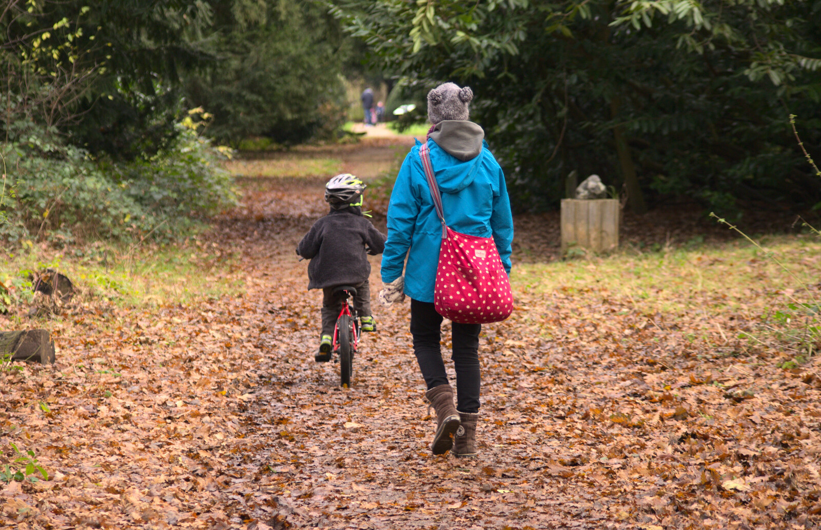 Isobel follows Fred's bike from Cameraphone Randomness and a Thornham Walk, Suffolk - 14th December 2014