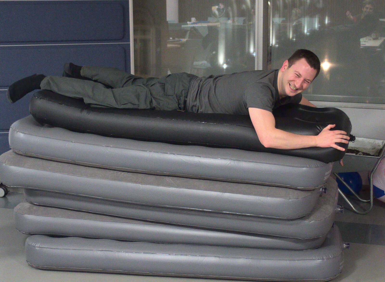 Joe piles on to a heap of air beds from SwiftKey Innovation Nights, Westminster, London - 19th December 2014
