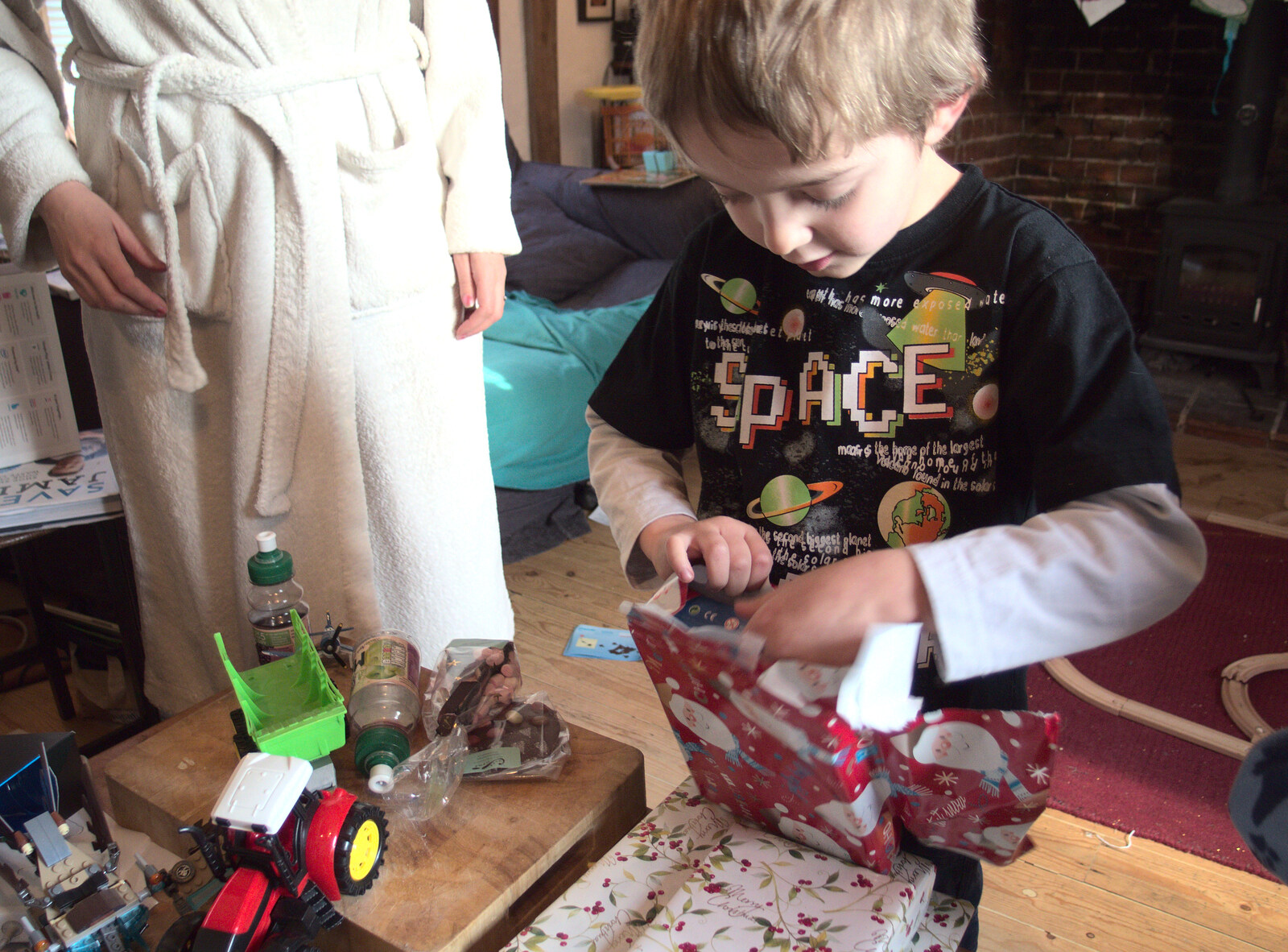 Fred tears into a present from Christmas Day at the Swan Inn, Brome, Suffolk - 25th December 2014