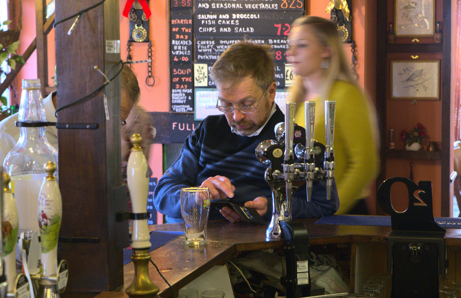 Marc pokes around on his phone from Christmas Day at the Swan Inn, Brome, Suffolk - 25th December 2014